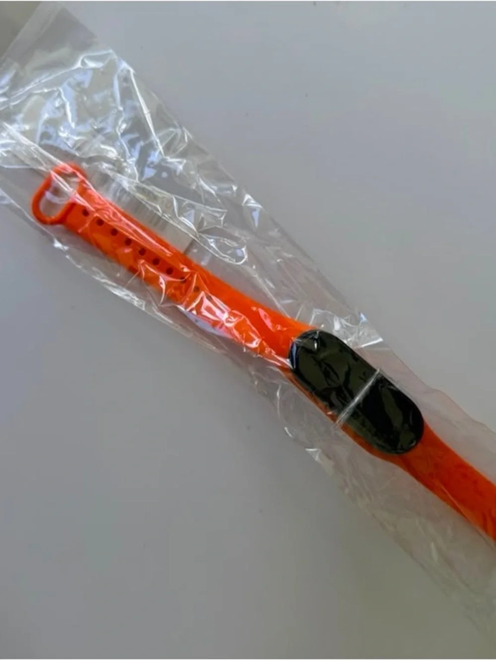 Replaceable Orange Silicone Smartwatch Band with Black Tracker Module